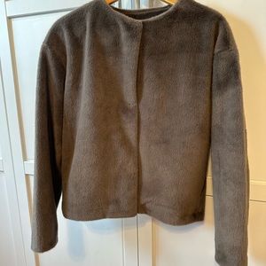 Uniqlo really soft coat. Has stud buttons. Wide fit. Size M.